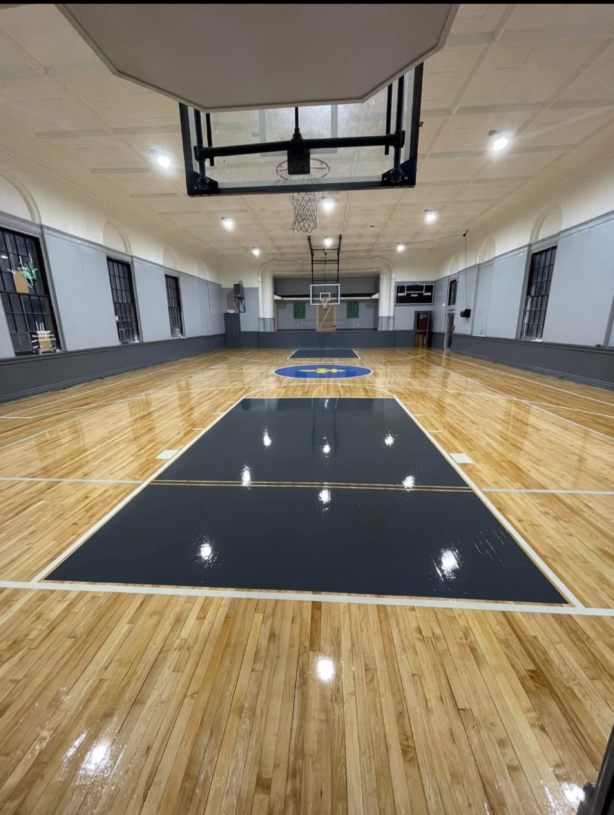 Gymnasium basketball court from the baseline