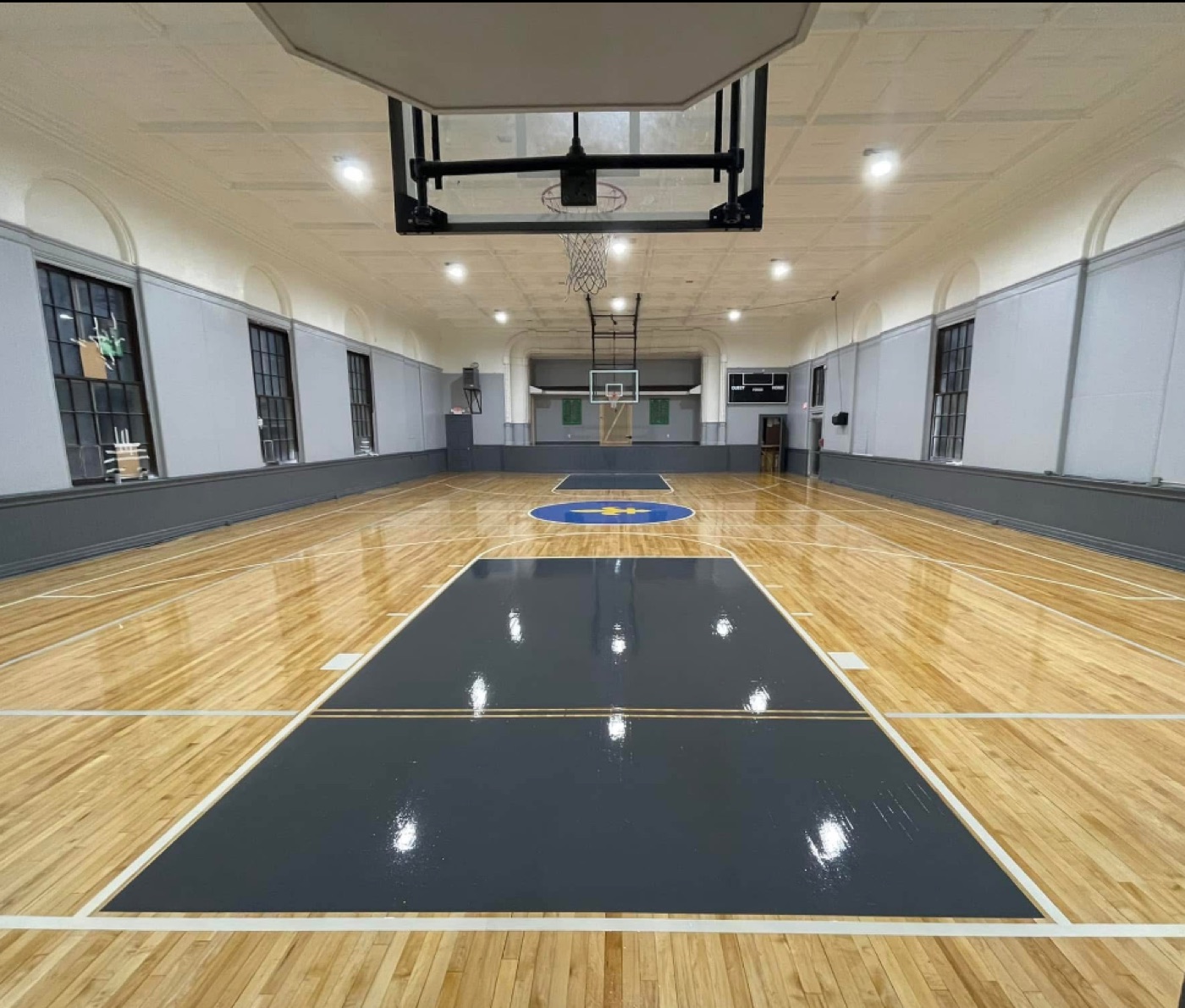 Full view of the gymnasium court and hoops