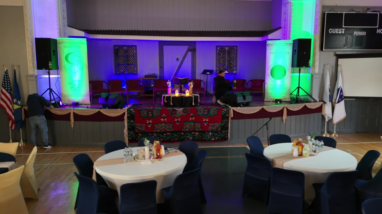 Event hall stage with lighting and decor